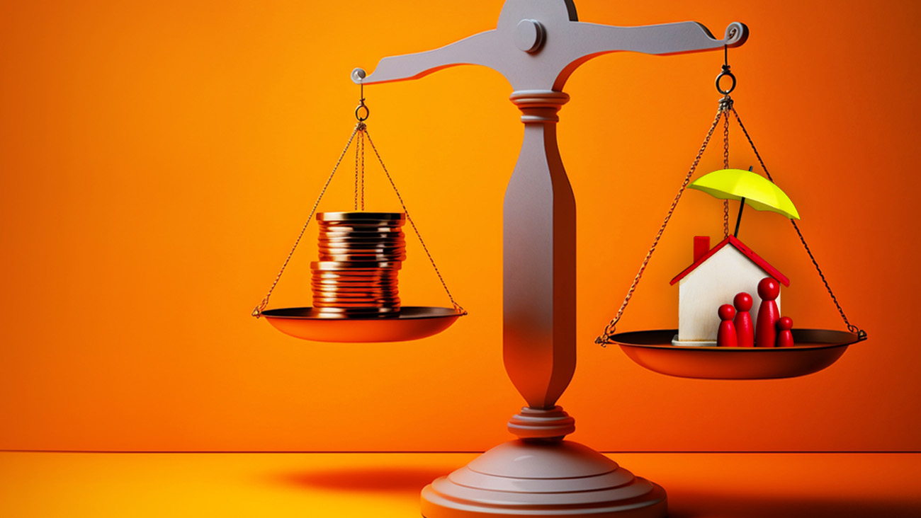 A balance scale against an orange background weighs coins on one side and a small house with a yellow umbrella and red figures on the other. The image symbolizes the balance between money and home security.