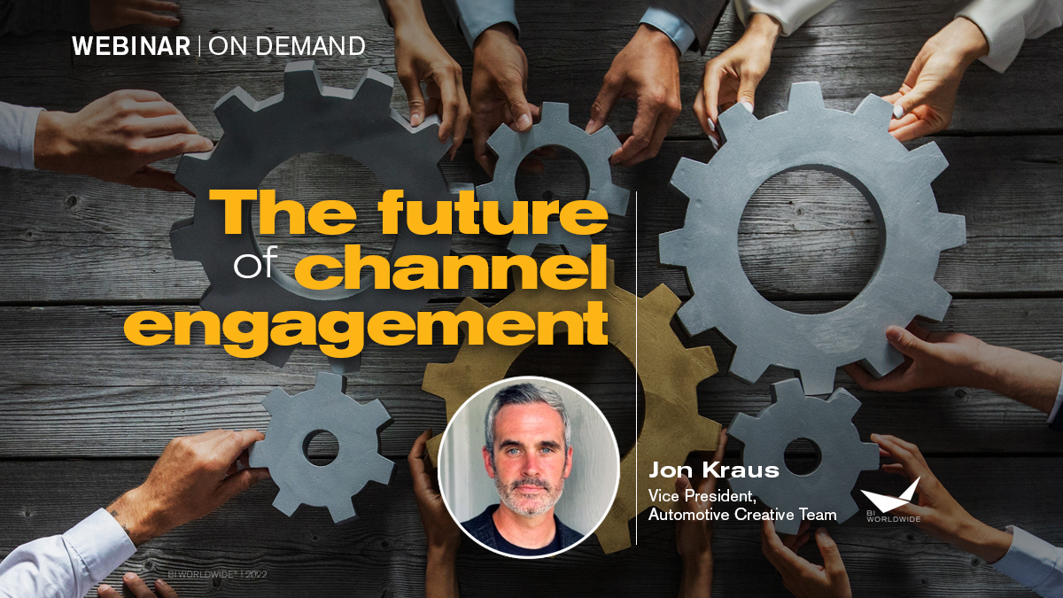 A group of hands meticulously piecing together large, interlocking gears on a wooden surface. The future of channel engagement unfolds with Jon Kraus, Vice President of the Automotive Creative Team, featured in a circular inset.