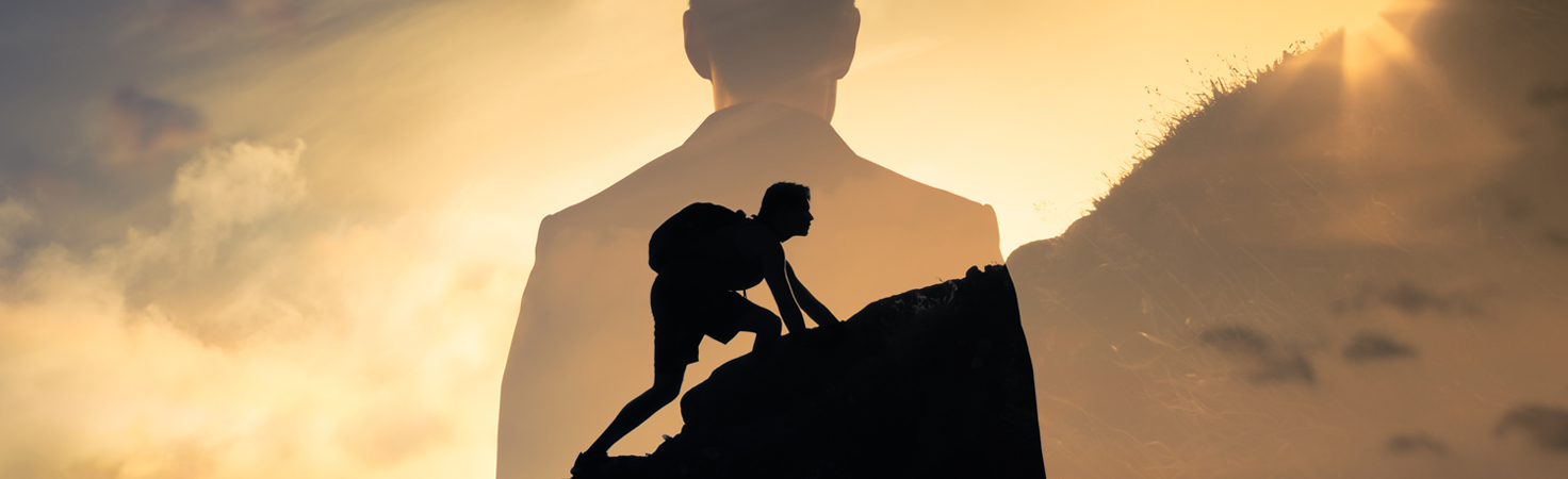 People Never giving up, strength and power. Man feeling determined climbing up a steep mountainside.